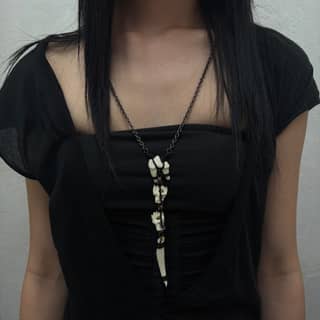 Large nail mixed bone necklace