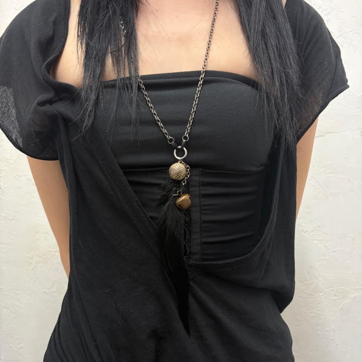 S.bell feather necklace
