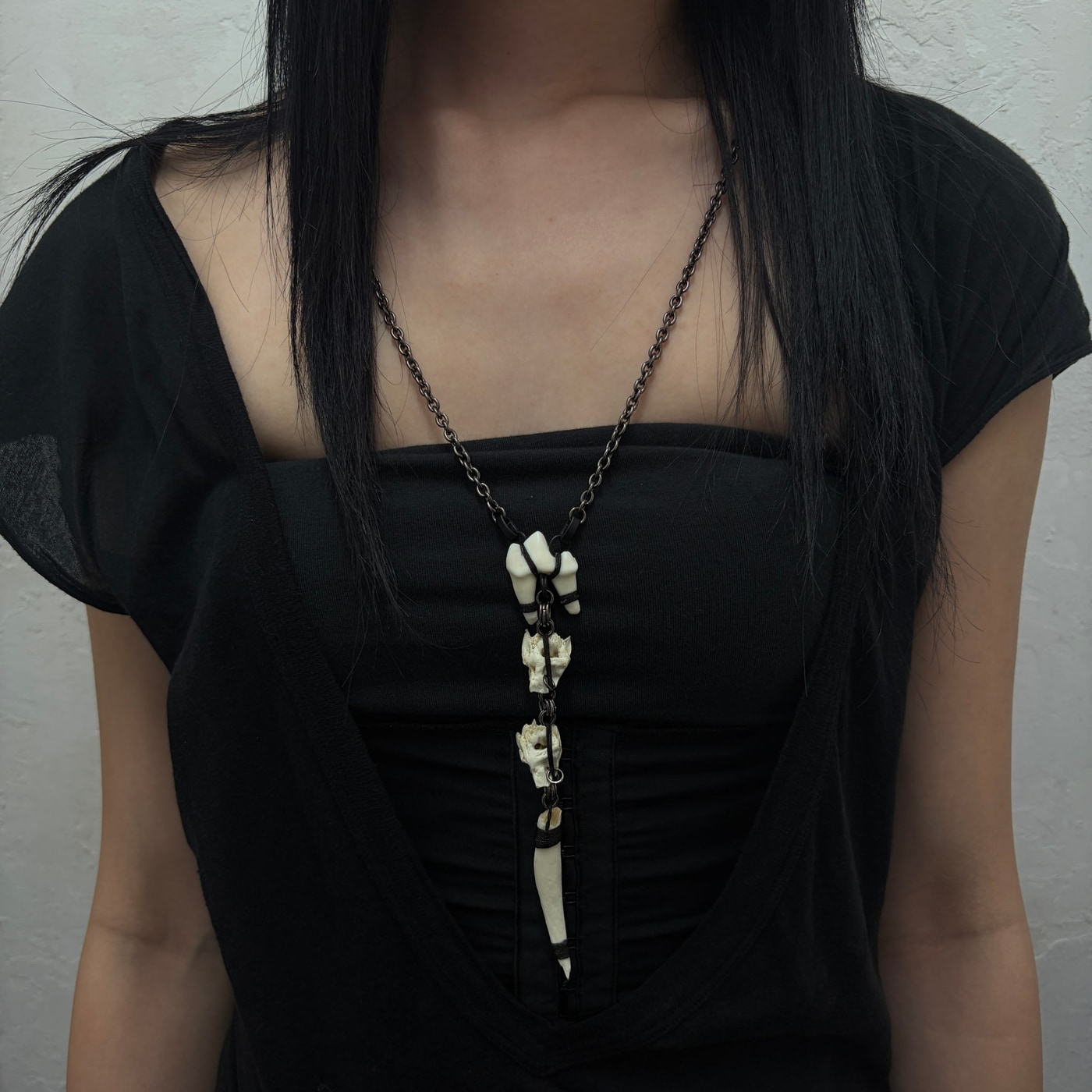 Large nail mixed bone necklace