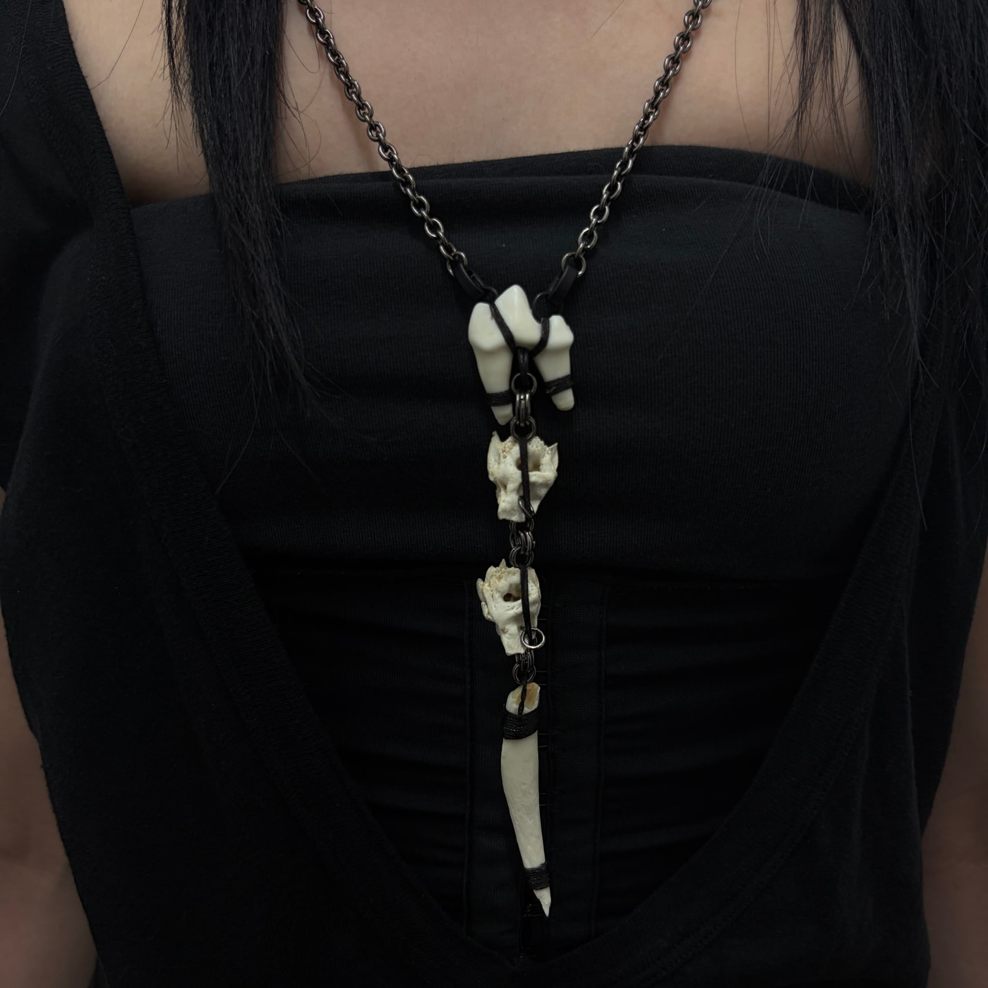 Large nail mixed bone necklace